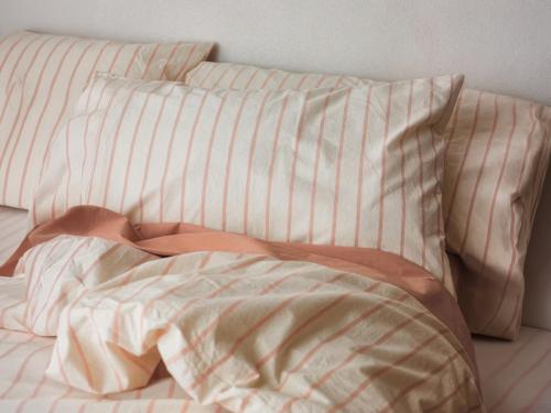 Blush Pink Slumber Stripe Cotton Pillowcases Styled Bedroom Setting