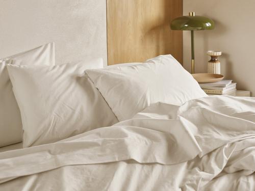 Mindful Cream Cotton Pillowcases Styled Bedroom Setting