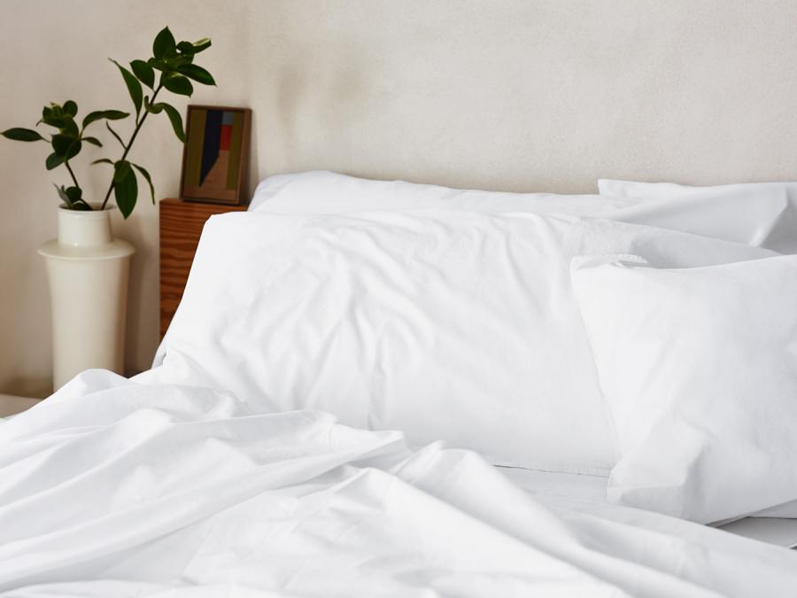 White Cotton Pillowcases Styled Bedroom Setting