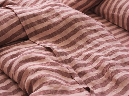 Rhubarb/Rose Pembroke Stripe Linen Blend Fitted Sheet Styled